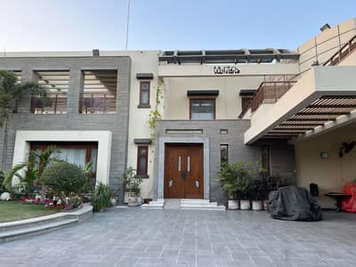 Stunning 2000 Yards Bungalow is Available For Rent With Swimming Pool Or Basement