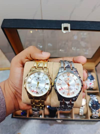 Rolex watch golden and rose n silver