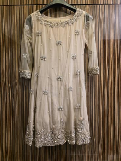 beige peplum with dabka amd moti handwork