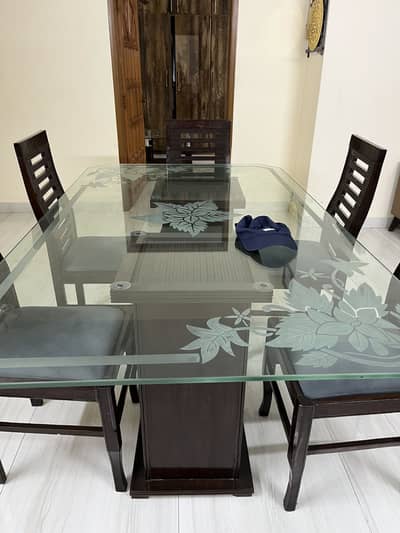 WOODEN TABLE WITH THICK GLASS