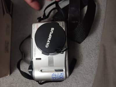Olympus camera in running conditions all accessories