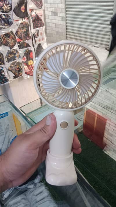 portable fan . . . with light inside