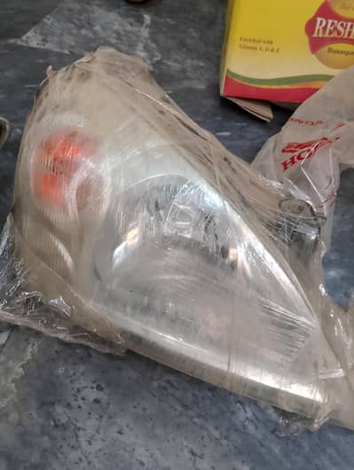 suzuki liana head light all ok