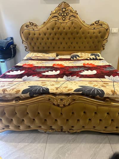 King sized Bed with Dressing side tables and coffee chairs