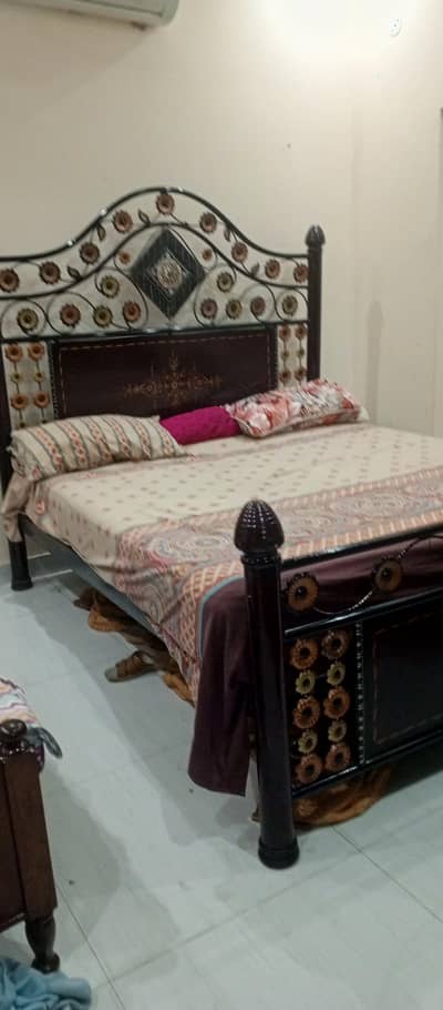 bed along with matress and side tabl