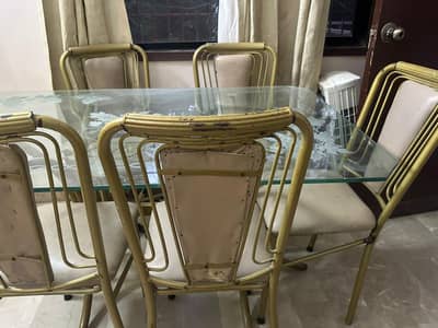 Iron rod table with 6 chairs.