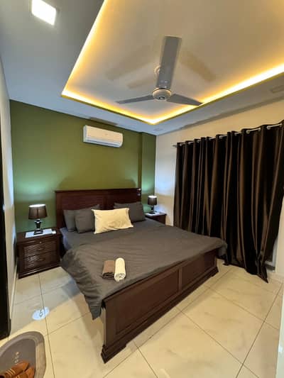 One bedroom apartment per day available Gulbug green Islamabad lukurya furnished apartment
