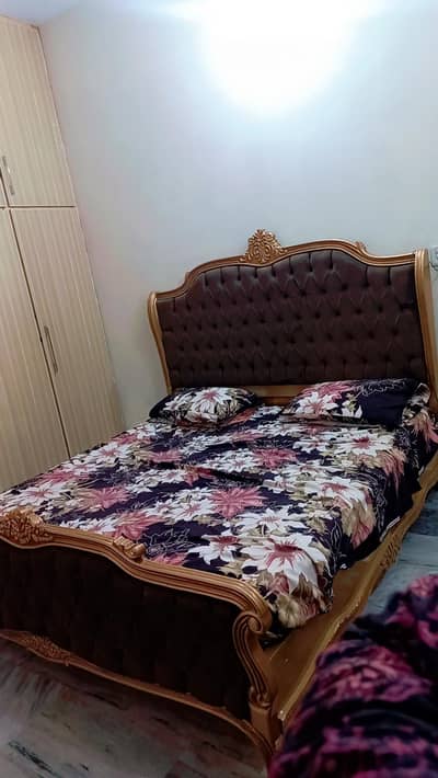 King size bed with side tables and dressing