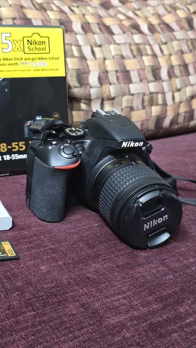 Nikon D3500 with 18-55 mm lens, 32 GB memory card, charger and bag