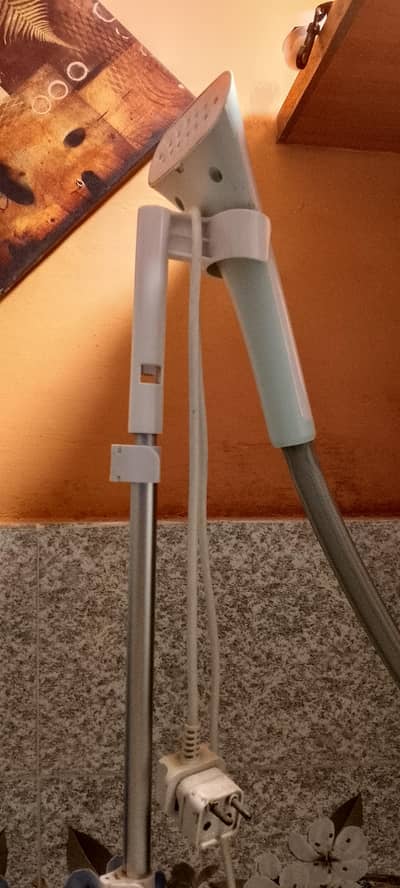 Excellent condition of steam iron with box.