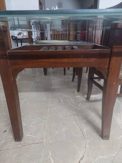 Glass top dining table