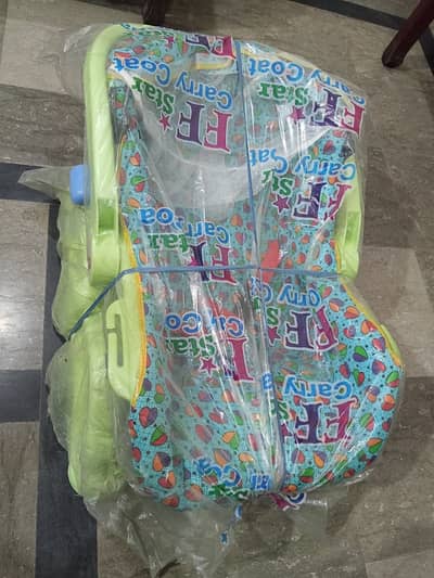 Baby carry cot (with swing) for sale