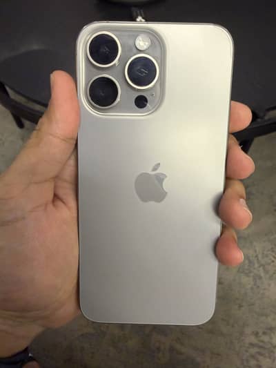 iPhone 15 Pro Max 256GB in Natural Titanium color.
