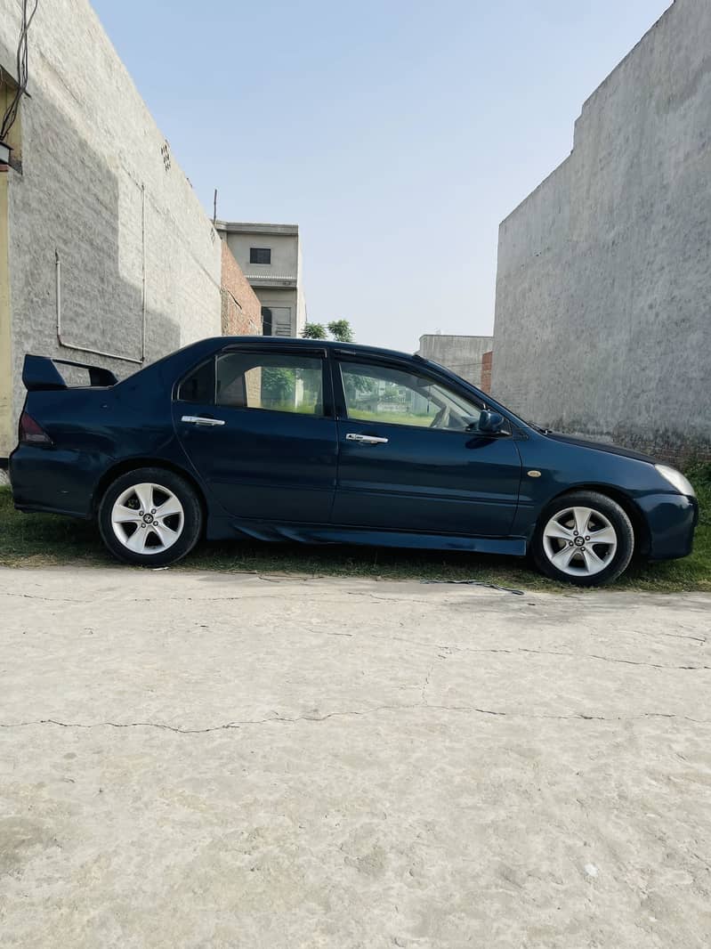 Lancer GLX 1.3 Auto 1