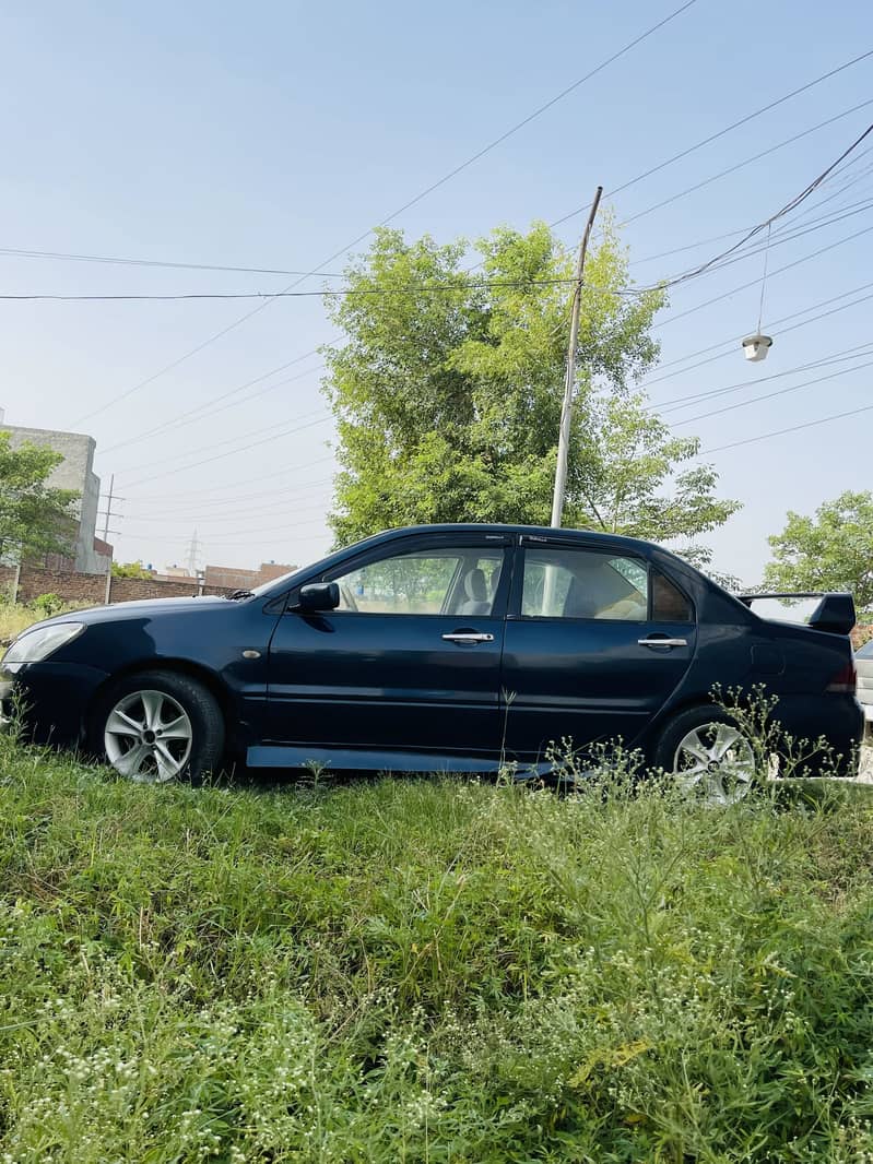Lancer GLX 1.3 Auto 3