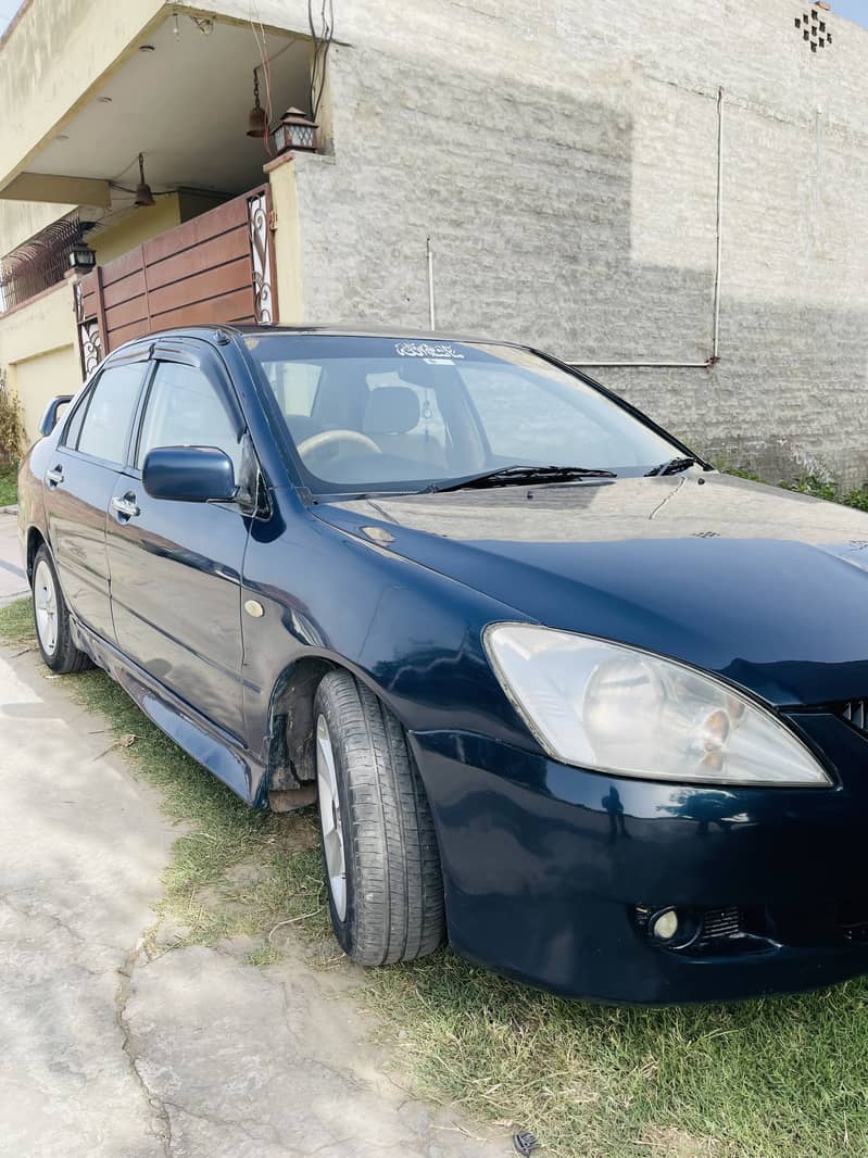 Lancer GLX 1.3 Auto 4