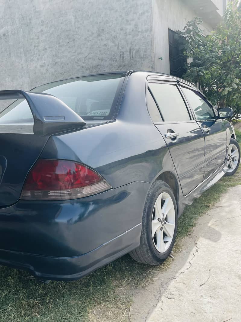 Lancer GLX 1.3 Auto 5