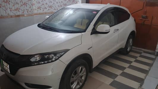 Honda Vezel Hybrid In White Color, Good Condition.