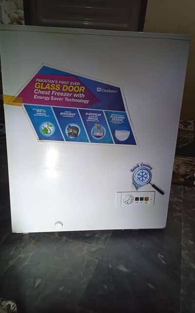 one mounth used  Dawlance first glass door chest freezer.