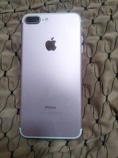 Apple iPhone 7 Plus with charger and case