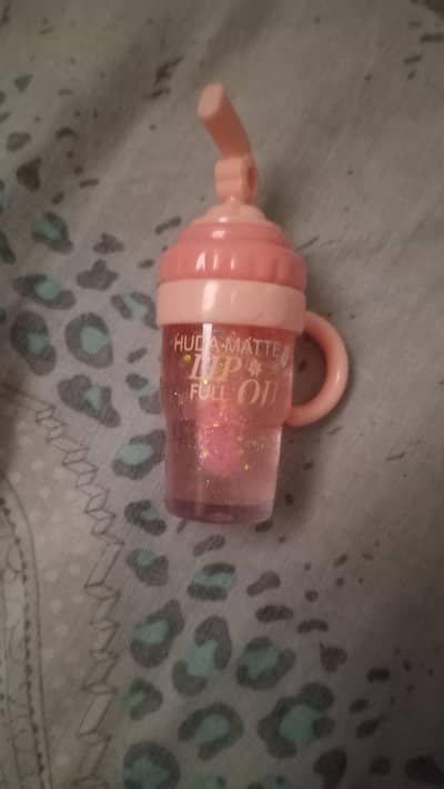 pink glitter lip oil