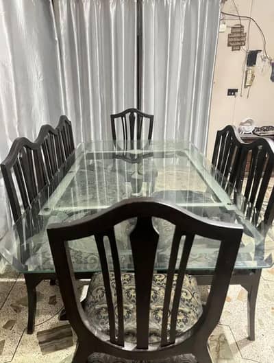 8 seater glass top wooden dinning table