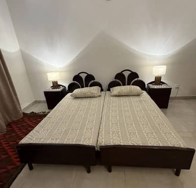 Single beds with side tables (pair)