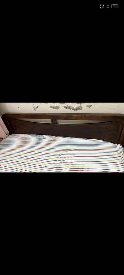 wooden bed with medicated foam