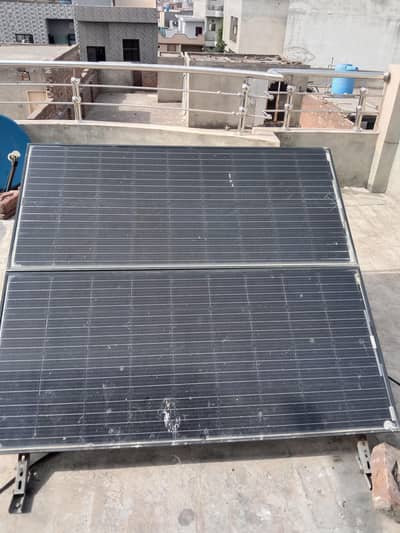Two solar panels with stands used condition