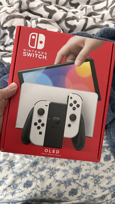10/10 Canada version nintendo Switch Oled 23games loaded 256gb