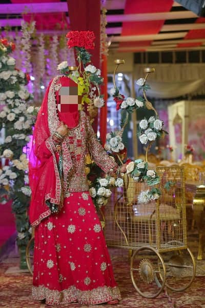 Ruby red designer Bridal Lehenga (worn once) perfect condition