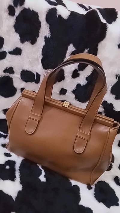 like a new brown  bag