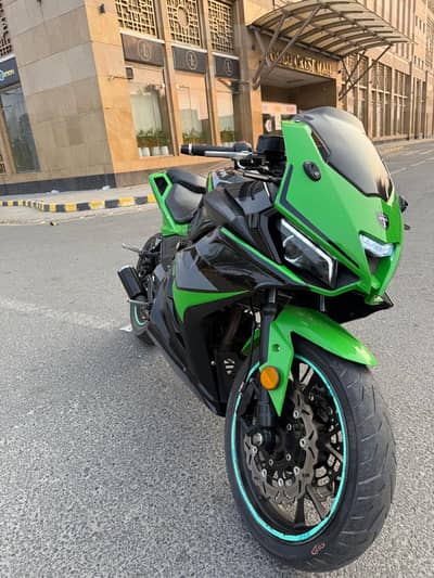 Green heavy bike urgent sale stam per photo ad ha mene 550 ki li thi