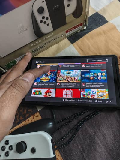 Nintendo Switch OLED  10/10 Cndition. Games + All accessories + Box
