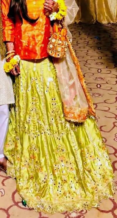 Orange & Lime Green mendhi Lengha choli set with potli bag and jewelry