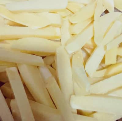 Golden frozen fries  flour coated