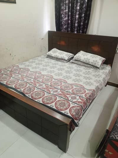 double bed with side tables dressing table and spring mattress