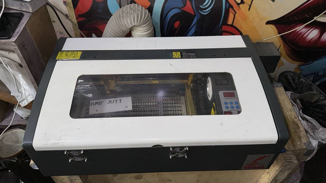 Laser cutting machine 1