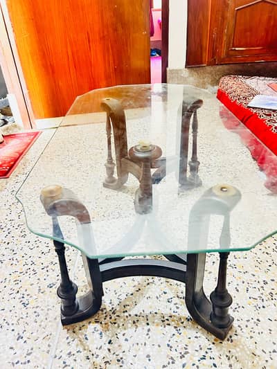 Glass top wooden table