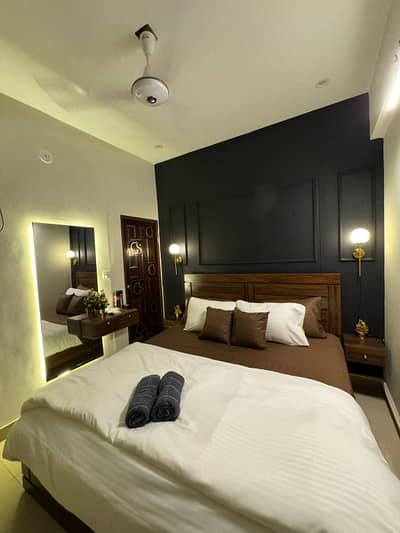 One bedroom apartment per day available Gulbug green Islamabad lukurya furnished apartment