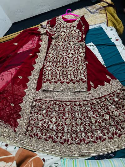 Elegant Mehroon Lehenga with Heavy Naqshi & Dabka Work – Worn Once