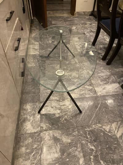 Glass top metal table