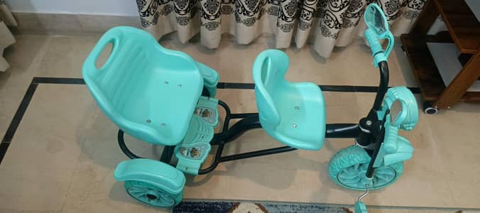 Slightly used double seat tricycle