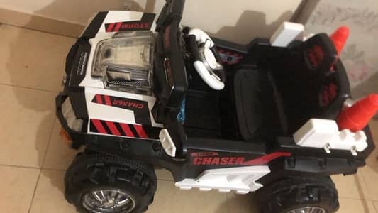 Kids Electric Ride-On Jeep Storm Chaser for sale in good condition.