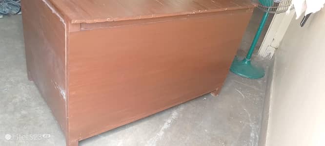 I am selling my iron/ computer table at new colony chashma