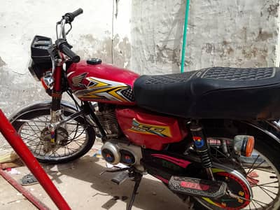 United 125 red 16 model
