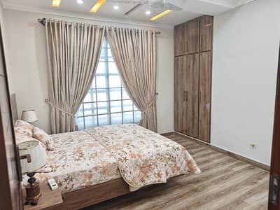 Fully Furnished Luxury Apartment for Rent, Daily Basis & Weeks Days Available ) Beautiful 2 Bedroom Flat Available) Camera Security Available Luxury Building This Flat in Soan Garden