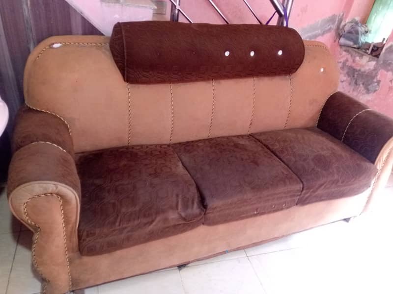 Three seater old sofa 1