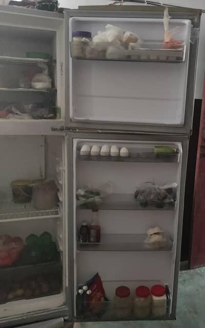 Singer Company Ka fridge hai 03113562413
