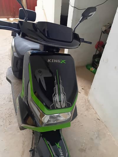 king x scooty for sale 10/10 condishan 7 days use mixem speed 55and60